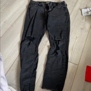 black ripped jeans